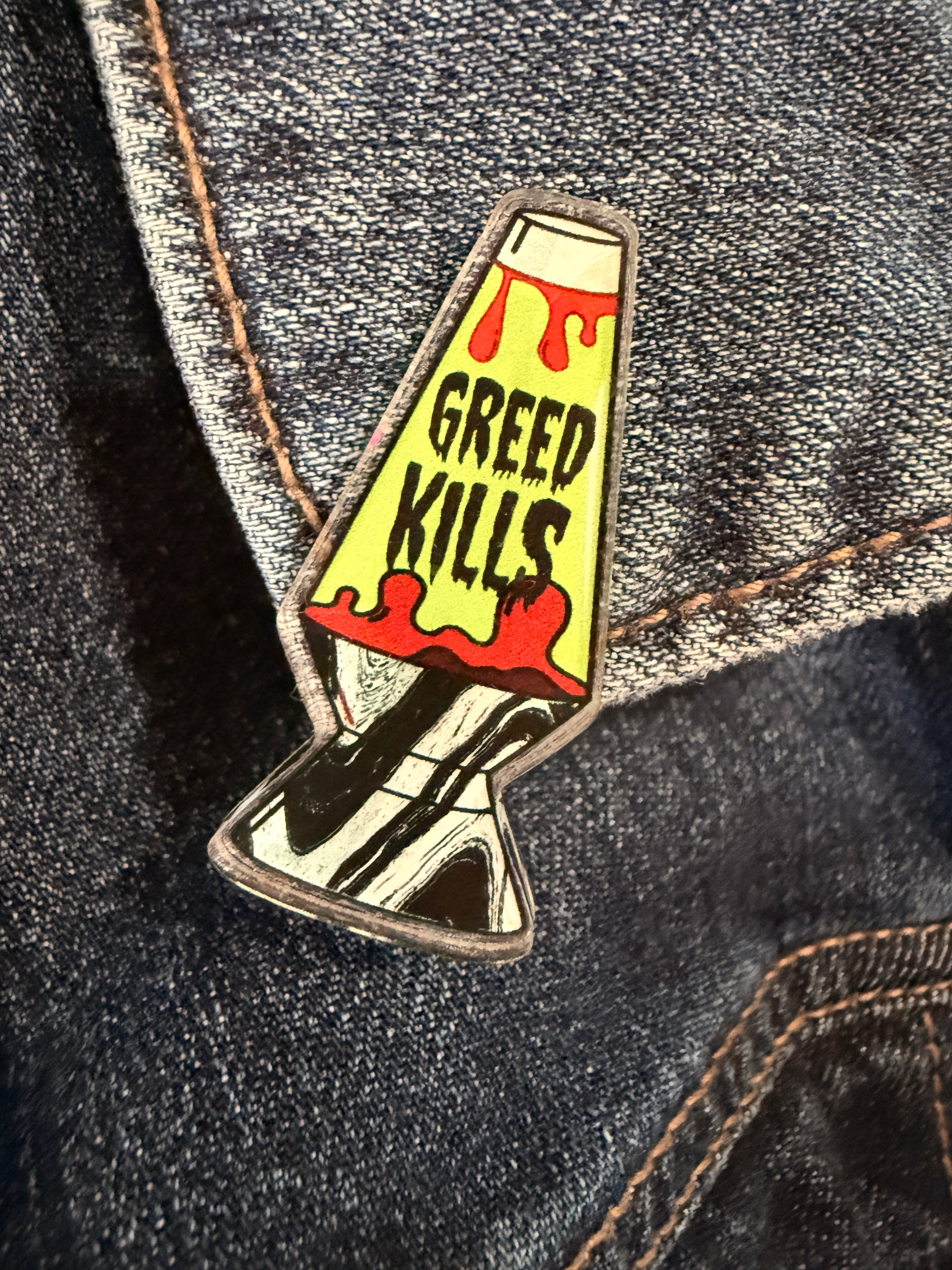 Greed Kills Lava Lamp Acrylic Pin