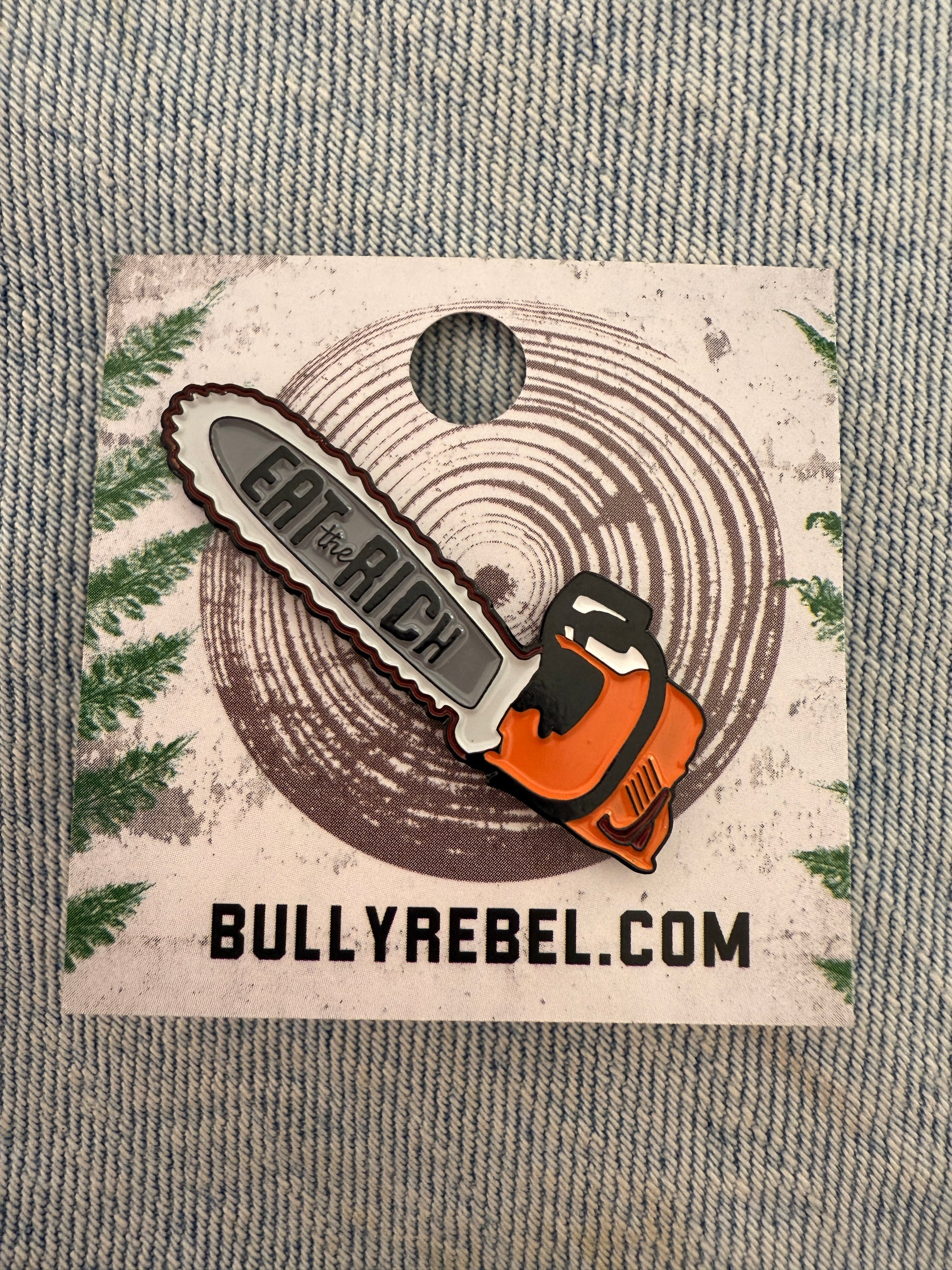 Chainsaw of Democracy Eat the Rich Enamel Pin